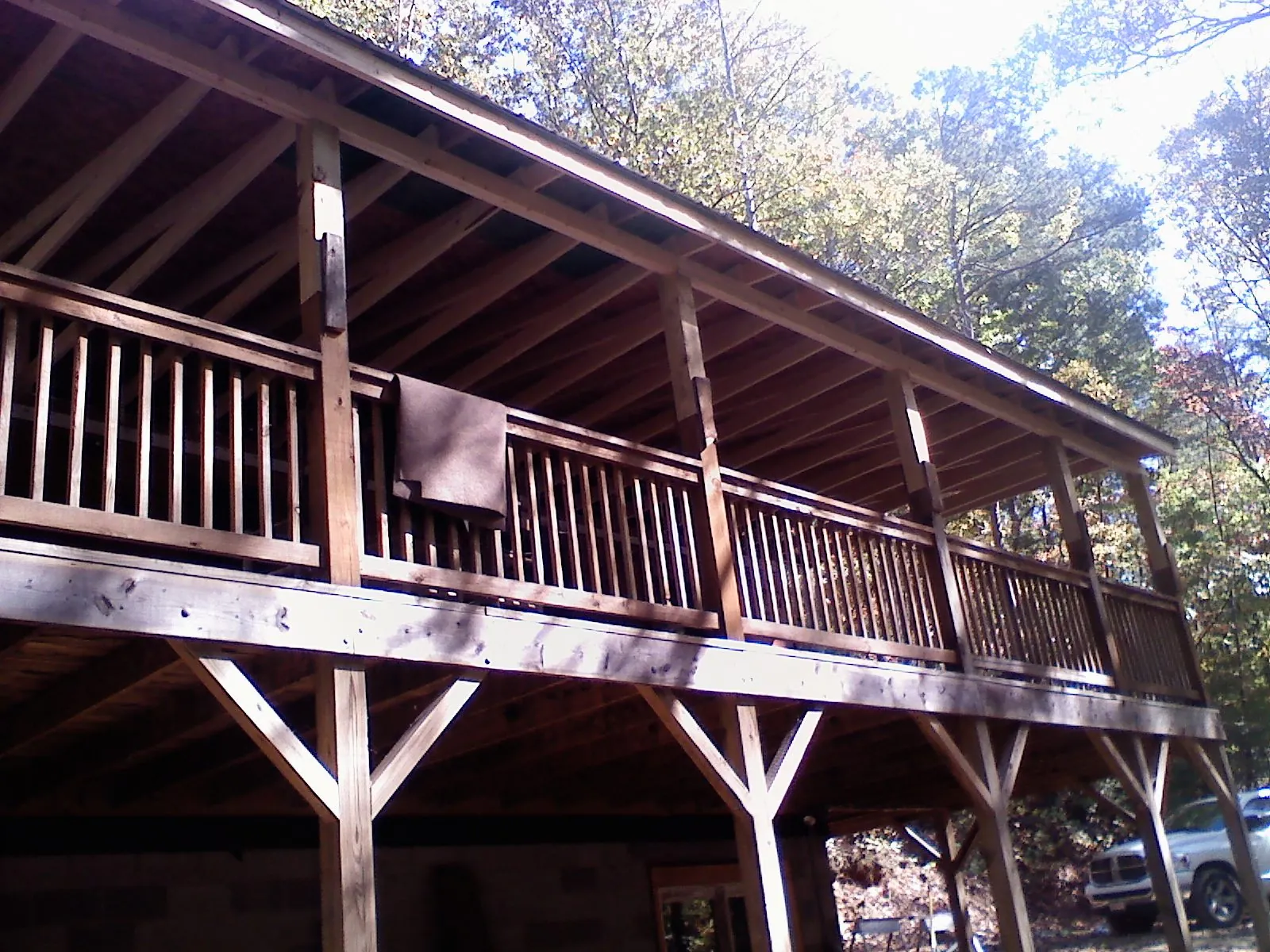 Timber framing under a new elevated porch and deck — Roof Leak Repair in Bartlett by Roofing Brothers